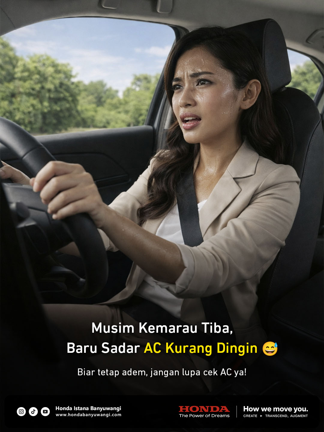 Seorang wanita berkeringat karena AC mobil tidak dingin